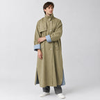 Aynho Oversized Trench Coat — Khaki oversized long trench coat worn by a model against a neutral studio backdrop.