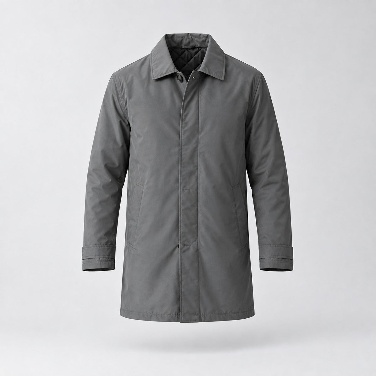 Chalcot Quilted Car Coat — Dark gray car coat shown on its own hovering against a neutral studio backdrop.