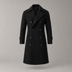 Norbury Cotton Blend Trench Coat — Black double-breasted trench coat displayed on its own against a pale stone studio backdrop.