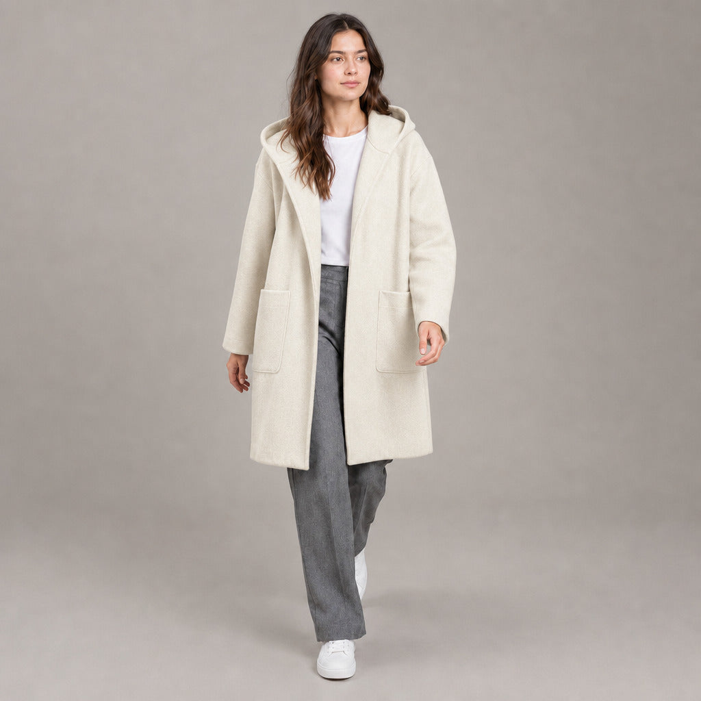 Lothian Brushed Hooded Coat — Solid soft cream relaxed mid-length hooded coat worn by a model against a neutral studio backdrop.