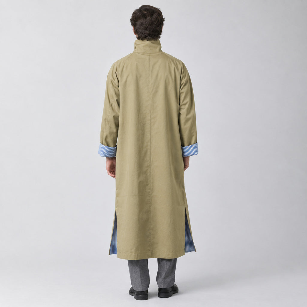 Aynho Oversized Trench Coat — Back of the khaki oversized long trench coat worn, showing the centre back seam.