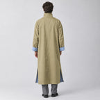Aynho Oversized Trench Coat — Back of the khaki oversized long trench coat worn, showing the centre back seam.