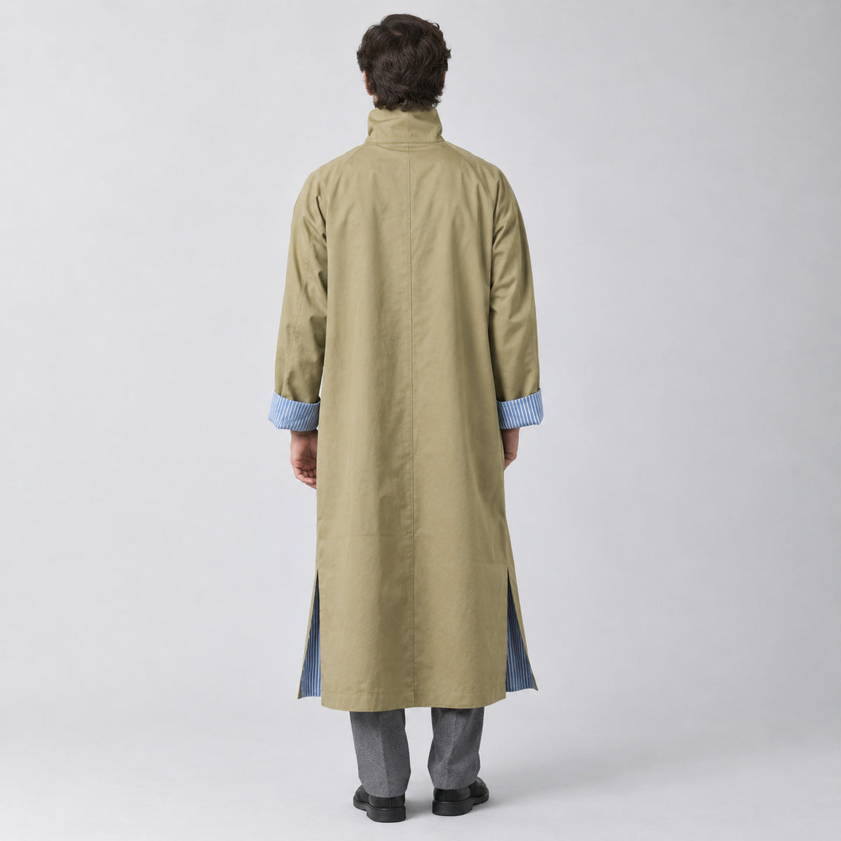 Aynho Oversized Trench Coat — Back of the khaki oversized long trench coat worn, showing the centre back seam.