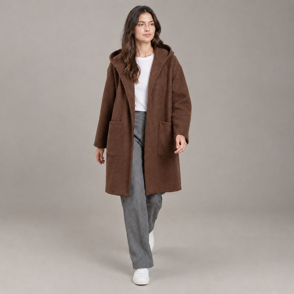 Lothian Brushed Hooded Coat — Solid warm brown relaxed mid-length hooded coat worn by a model against a neutral studio backdrop.