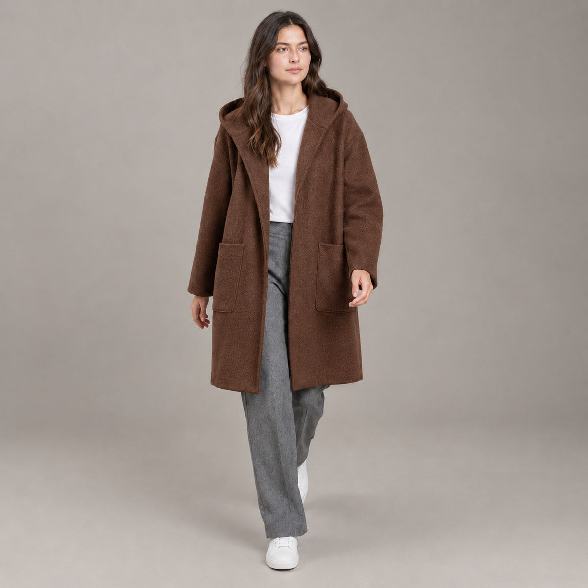 Lothian Brushed Hooded Coat — Solid warm brown relaxed mid-length hooded coat worn by a model against a neutral studio backdrop.