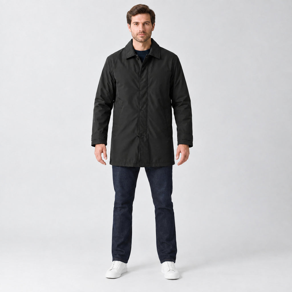 Chalcot Quilted Car Coat — Black car coat worn by a model against a studio backdrop.