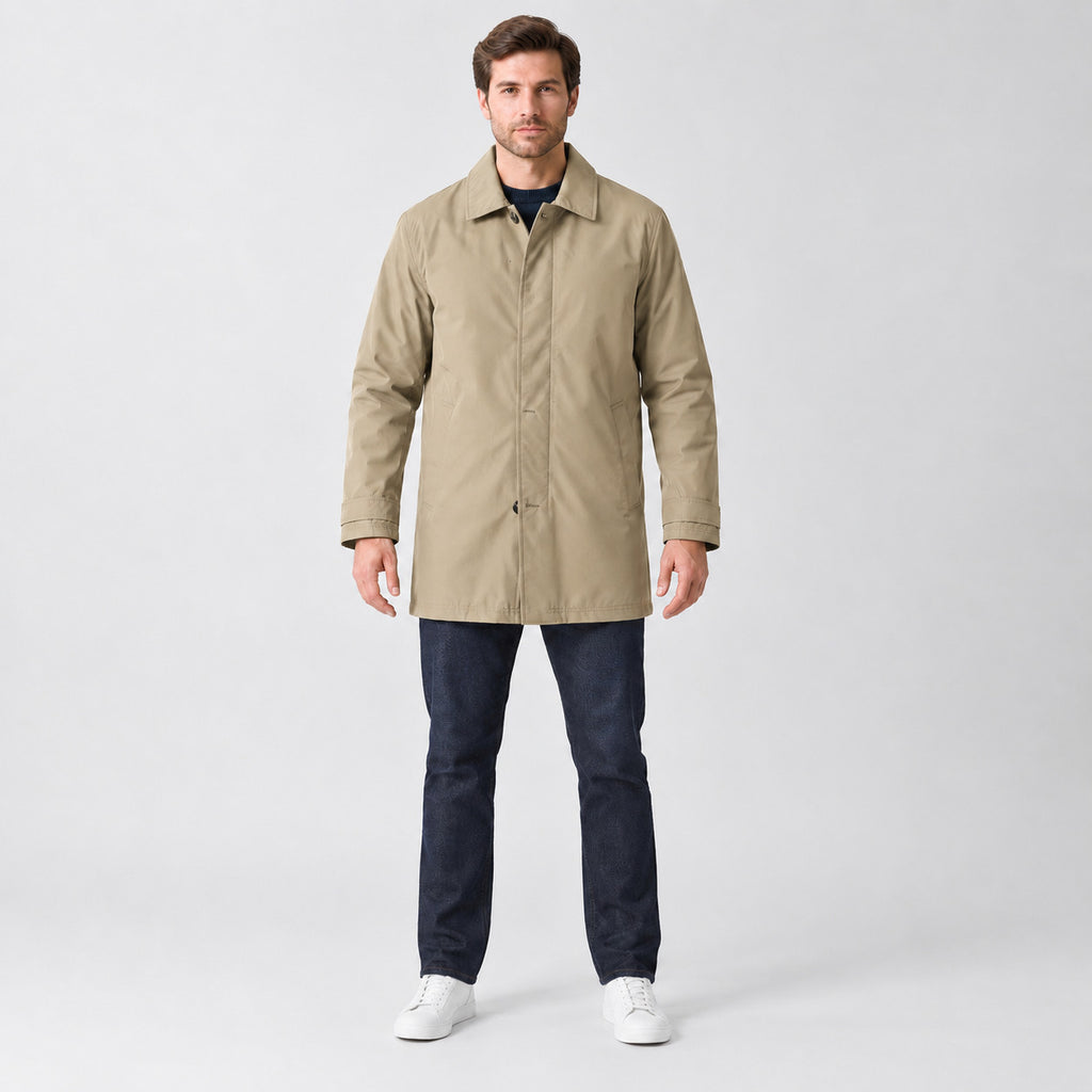 Chalcot Quilted Car Coat — Khaki car coat worn by a model against a studio backdrop.