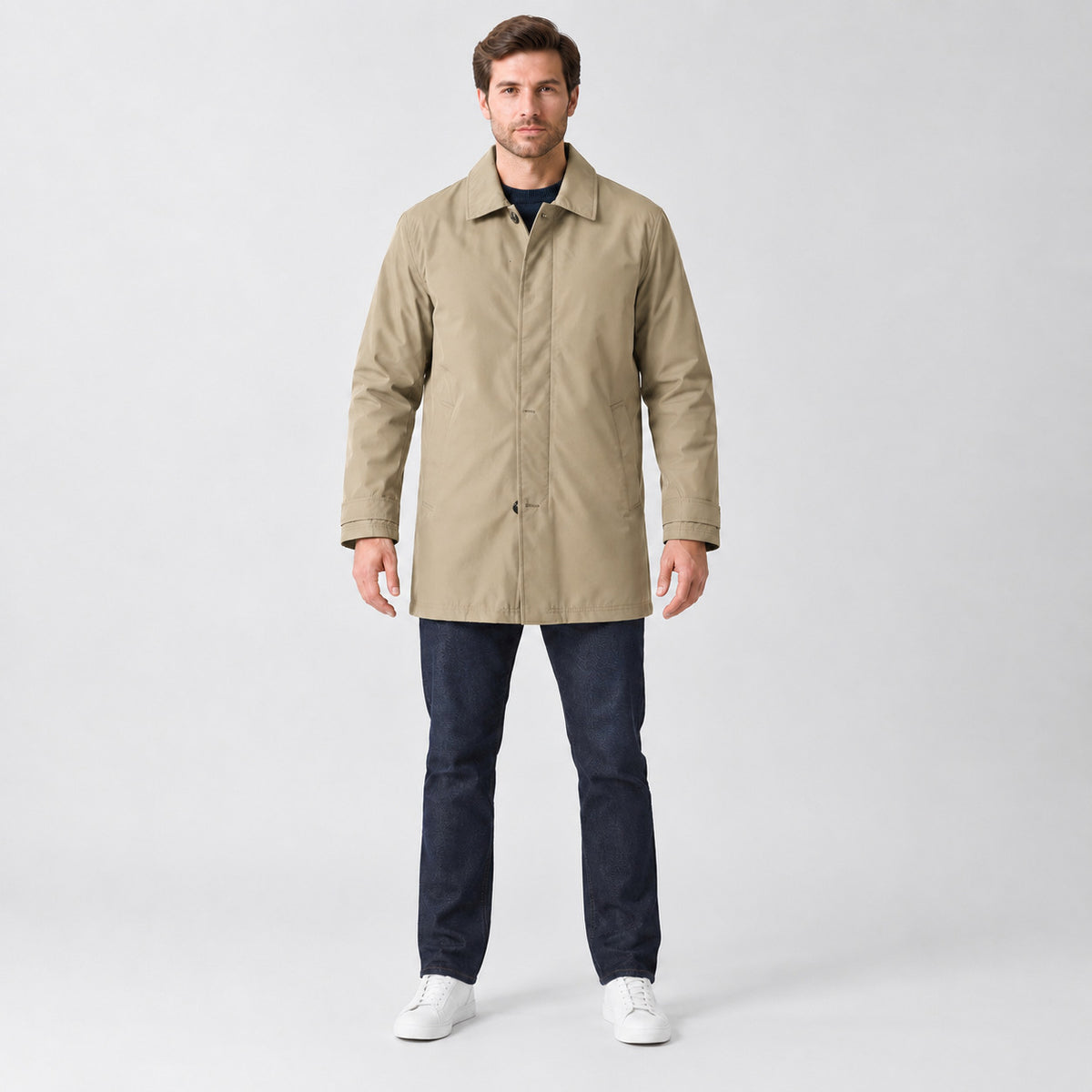 Chalcot Quilted Car Coat — Khaki car coat worn by a model against a studio backdrop.