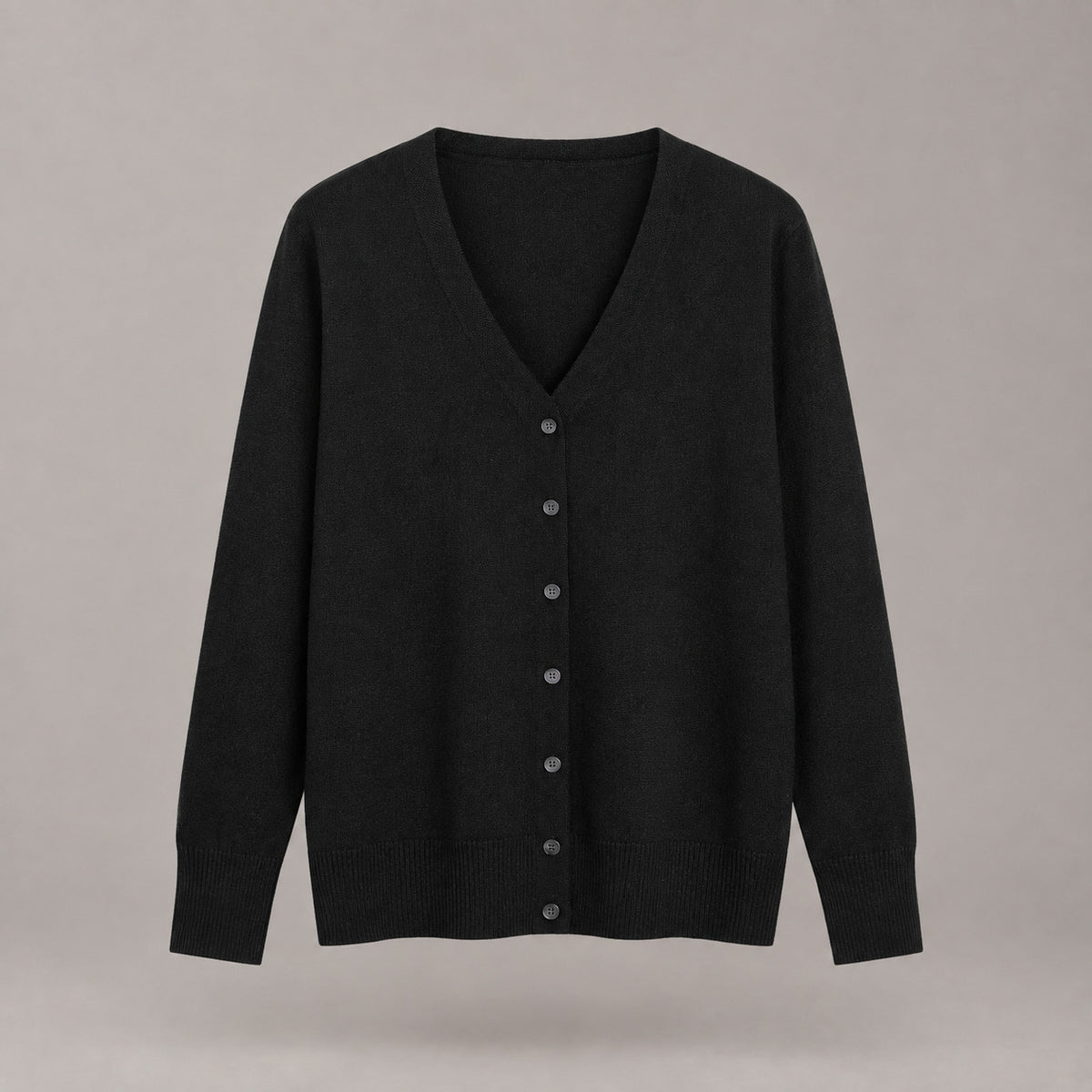 Merrion Fine Knit Cardigan — Black V-neck button-down cardigan laid flat against a neutral studio backdrop.