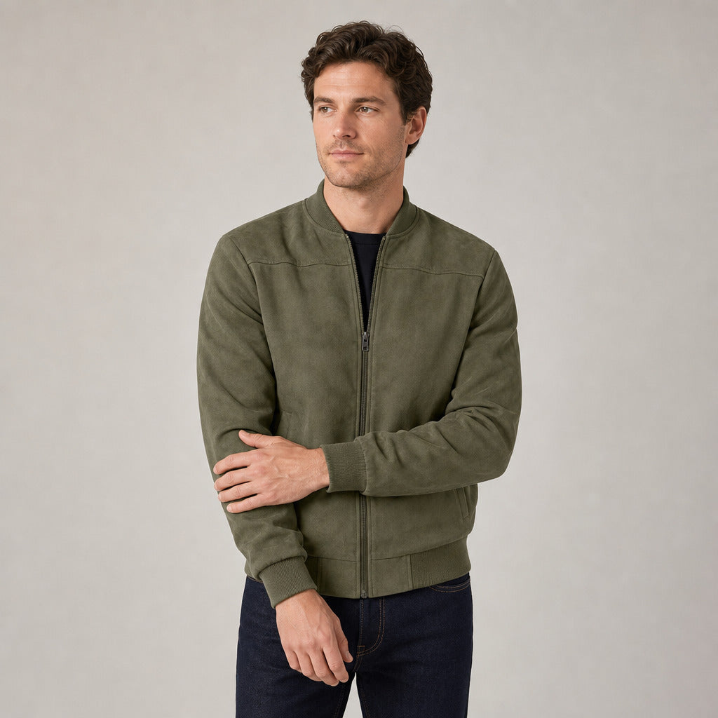 Hartfield Faux Suede Bomber Jacket — Army green faux-suede bomber jacket worn by a model against a pale stone studio backdrop