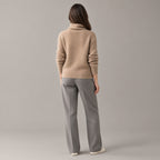 Rothbury Ribbed Knit Turtleneck — Back of the camel turtleneck sweater worn, showing the centre back seam.
