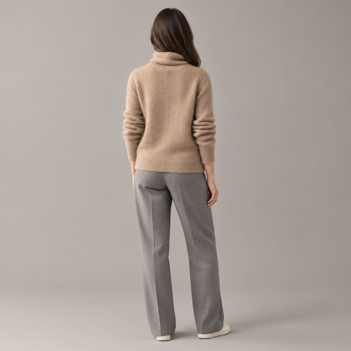 Rothbury Ribbed Knit Turtleneck — Back of the camel turtleneck sweater worn, showing the centre back seam.