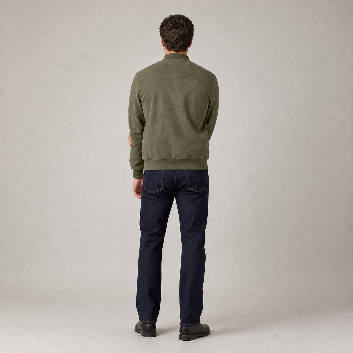 Hartfield Faux Suede Bomber Jacket — Back of the army green faux-suede bomber jacket worn, showing the back yoke