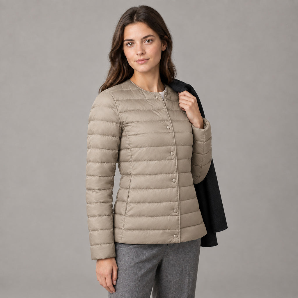 Hatherley Quilted Down Jacket — Khaki collarless quilted down jacket worn by a model in a neutral studio setting.