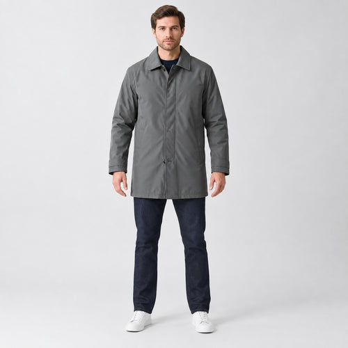 Chalcot Quilted Car Coat — Dark gray car coat worn by a model against a studio backdrop.